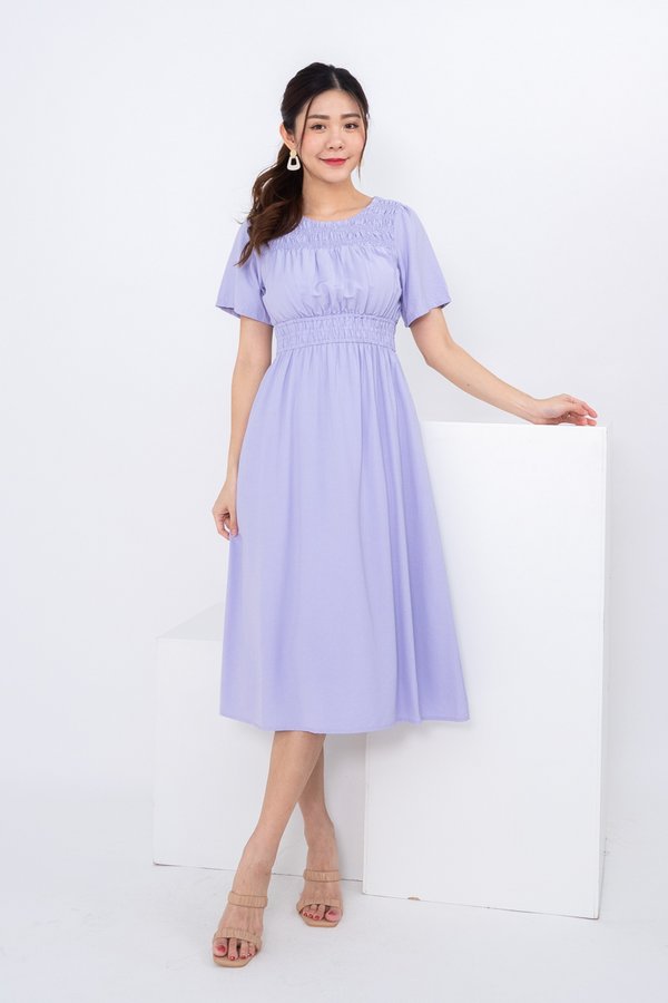Chelsia Puffy Sleeve Ruched Midi Dress in Lilac