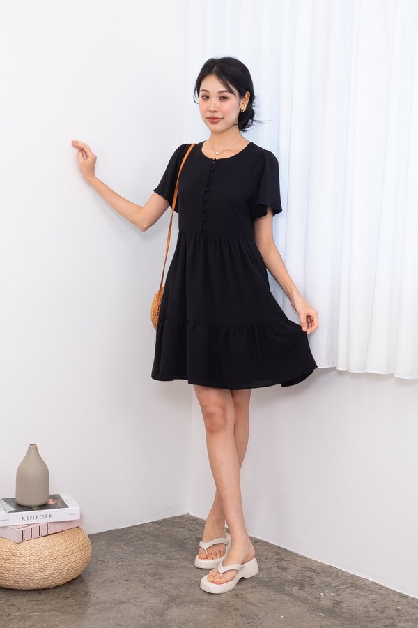 Klynn Flutter Sleeve Buttons Babydoll Dress in Black